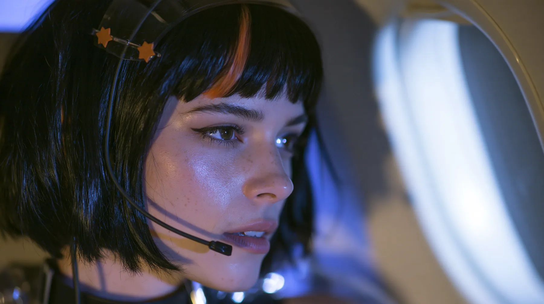 Jet-set high fashion editorial, a couture magazine story shot on a night flight: a close-up profile of a Caucasian American woman in her late twenties with a grown-up angular face, defined cheekbones and a strong…