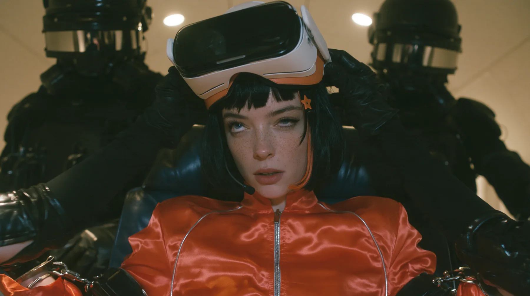 Cinematic close-up film still at eye level: a 32-year-old grown woman with elegant mature features, defined cheekbones and an angular jaw, pale freckled skin, a glossy black blunt bob with heavy bangs and one…