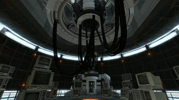 Portal 2 (2011) Source engine screenshot, Valve, the empty Aperture Science central AI chamber: the ceiling ring mount with thick black cables hanging down, dozens of old CRT monitors and flat panel screens stacked…