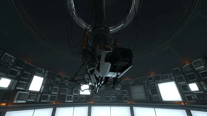 the same dark circular AI chamber with the ceiling ring and hanging cables, its curved walls now lined floor to ceiling with dozens of old CRT monitors and flat panel screens glowing faint white, warm amber accent…