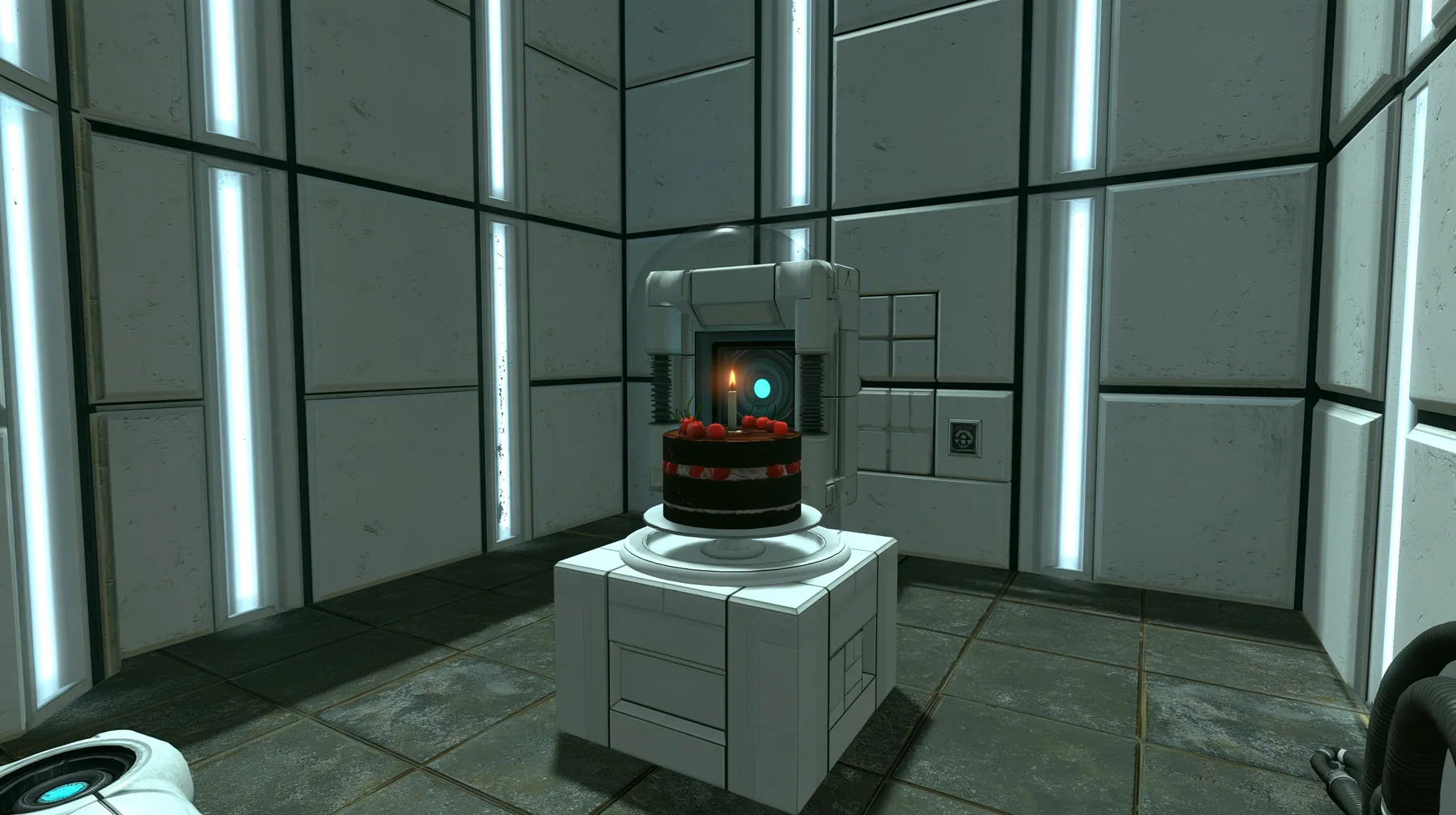 Portal 2 (2011) Source engine screenshot, Valve, a clean Aperture Science test chamber of white concrete panels with black seams and vertical light strips, a black forest chocolate cake with cherries and one lit…