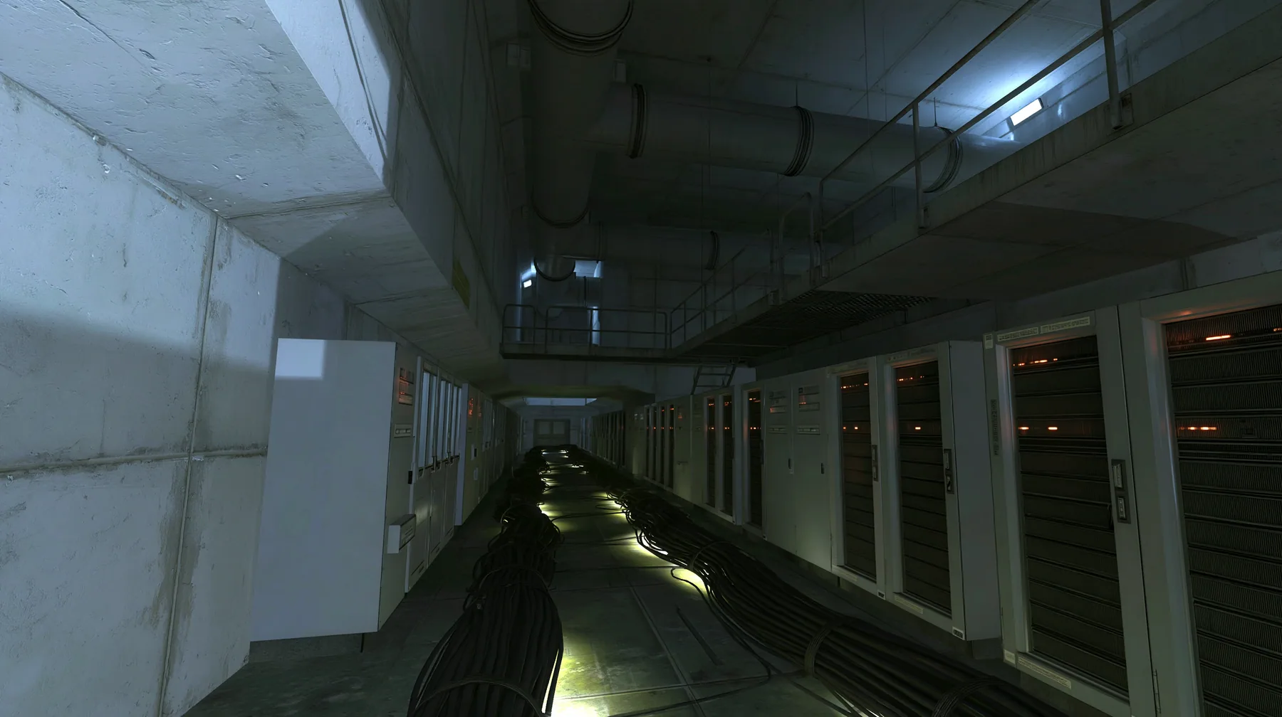 a long behind-the-scenes concrete corridor inside a vast facility, lined with tall 1970s mainframe computer cabinets with blinking lights, thick bundles of black cables running along the floor glowing faintly like…