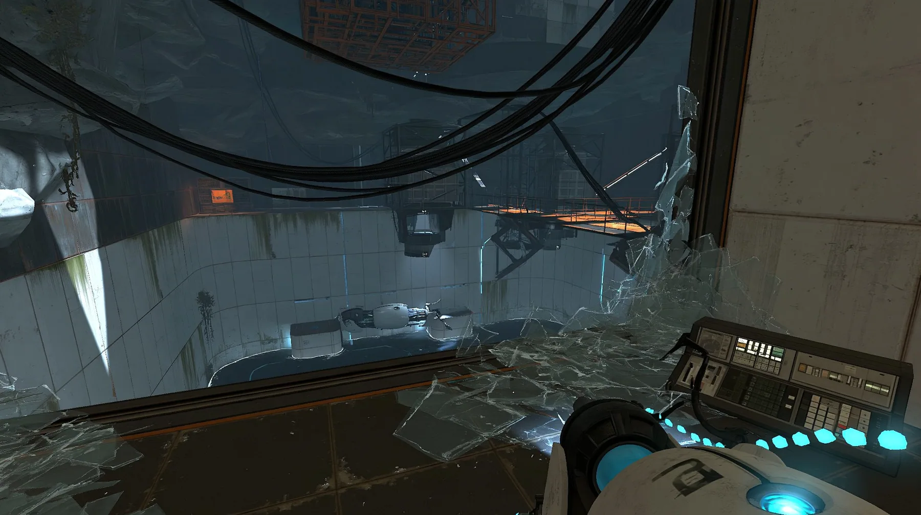 the same ruined test chamber seen from inside the observation booth above it, its big window smashed, glass shards across the console, Portal 2 Source engine screenshot