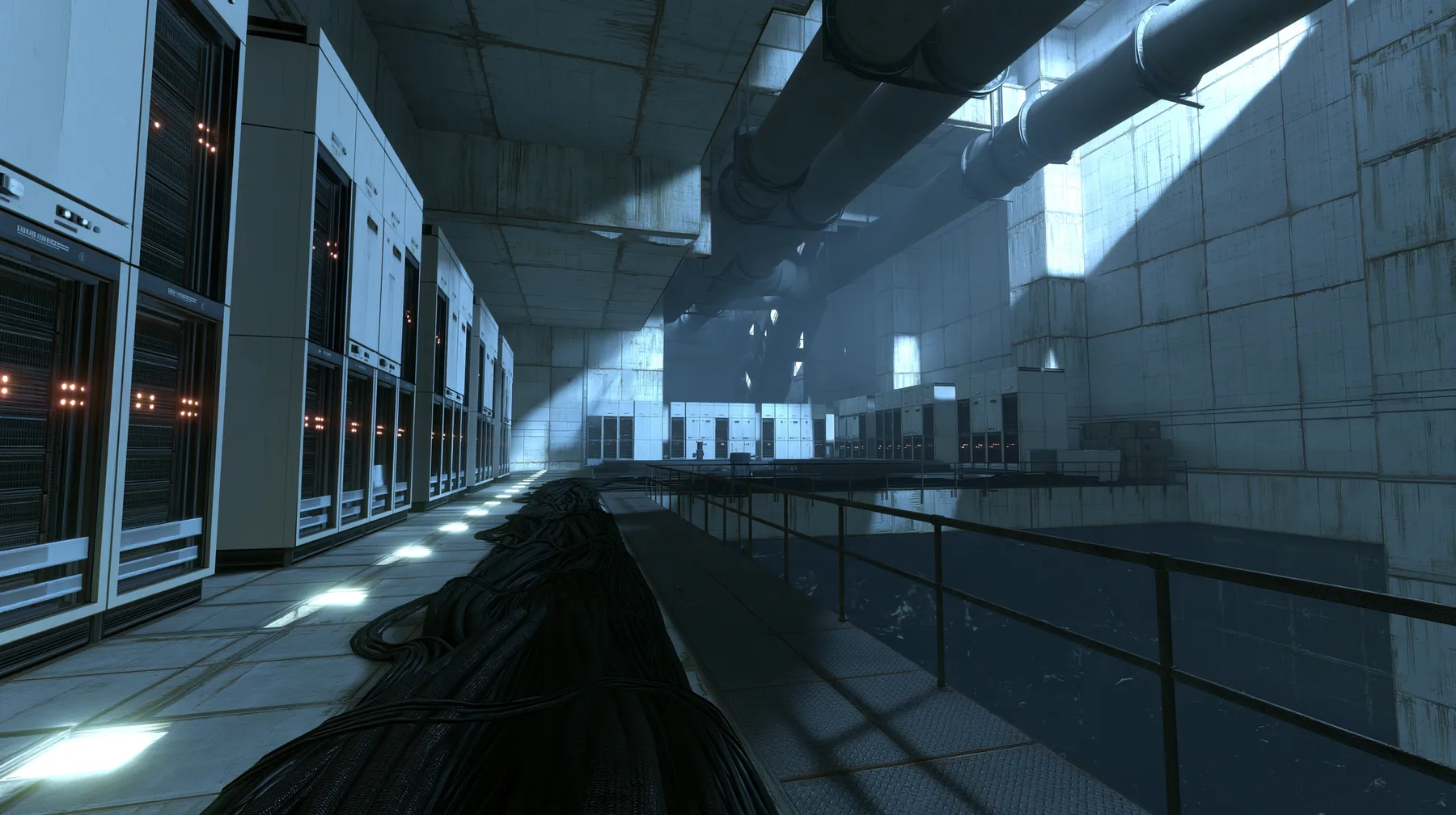 Valve's Portal 2 (2011), a Source engine screenshot: behind the scenes at Aperture Science: a long concrete corridor lined with tall 1970s mainframe server cabinets with blinking lights, thick black cable bundles…