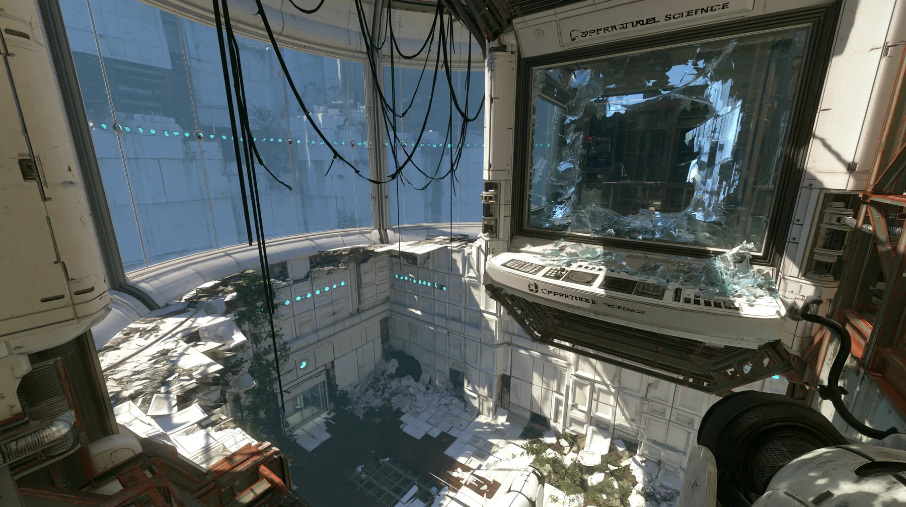 Valve's Portal 2 (2011), a Source engine screenshot: an Aperture Science observation booth high above a test chamber, its big window smashed, glass shards on the console and floor, the decaying white panelled chamber…
