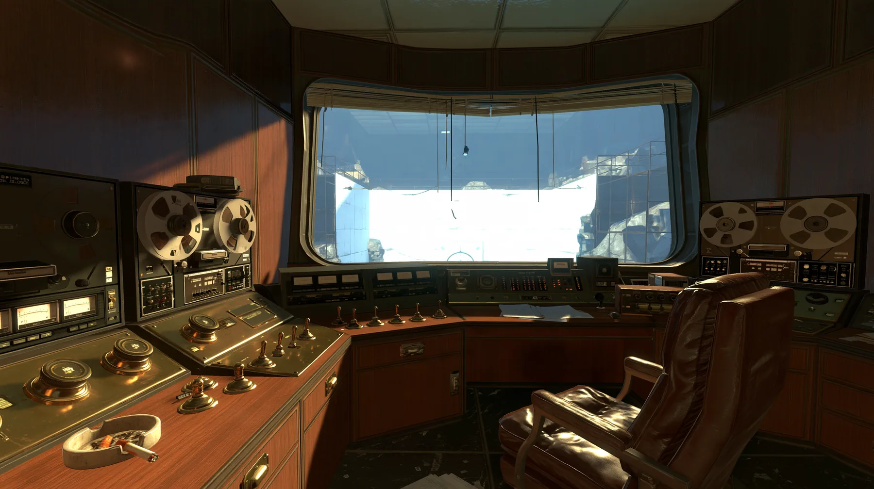 Portal 2 (2011) Source engine screenshot, Valve, old 1960s Aperture Science: Cave Johnson's wood-panelled observation booth, brass controls and toggle switches, reel-to-reel tape machines, an ashtray, a leather…