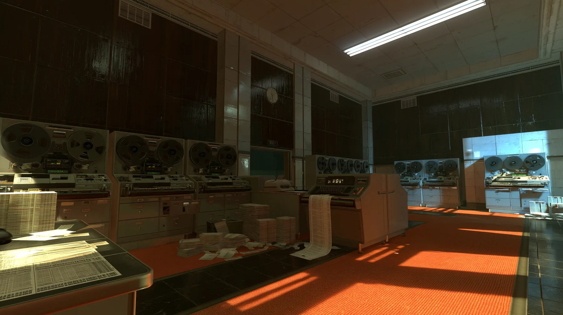 Portal 2 (2011) Source engine screenshot, Valve, old 1960s Aperture Science computer room: rows of reel-to-reel tape drives and punch card machines, stacks of punch cards, a printout spilling onto a desk, wood panels…