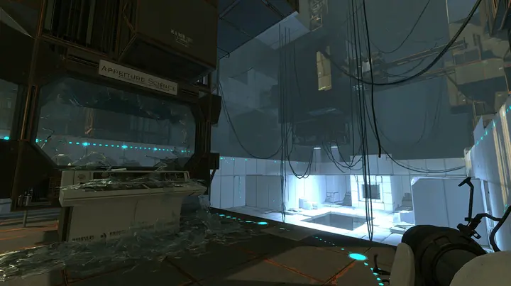 Portal 2 (2011) Source engine screenshot, Valve, a dark Aperture Science observation booth above a white test chamber, its big window smashed outward, glass shards across the console and the floor, the bright chamber…