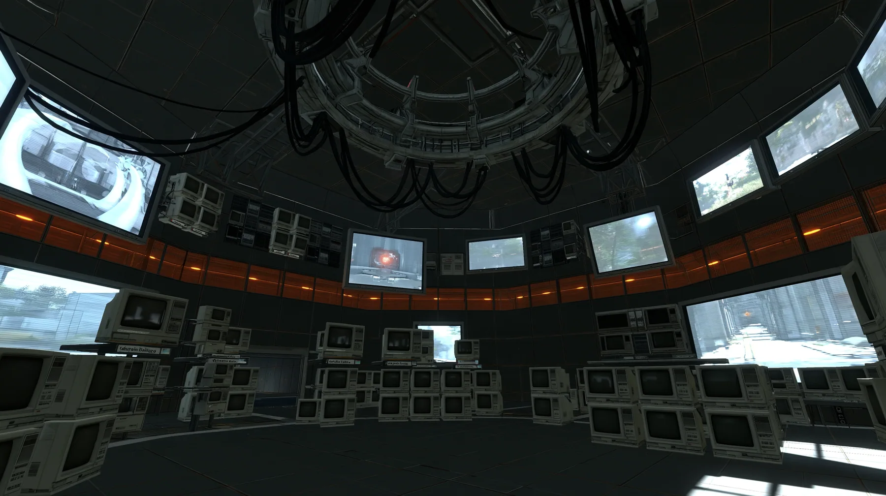 Portal 2 (2011) Source engine screenshot, Valve, GLaDOS's dark central AI chamber: the empty ceiling ring mount with black cables, dozens of old CRT monitors and panel displays around the curved walls, each screen…