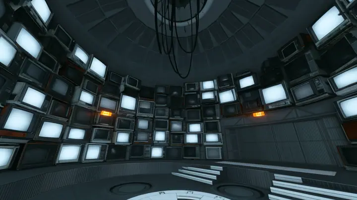 Remove the hanging robot, leaving only the white ceiling ring and its black cables hanging empty, and line the curved walls of the chamber with dozens of old CRT monitors and flat panel screens stacked floor to…