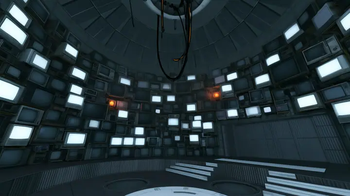 Remove the hanging robot, leaving only the white ceiling ring and its black cables hanging empty, and line the curved walls of the chamber with dozens of old CRT monitors and flat panel screens stacked floor to…