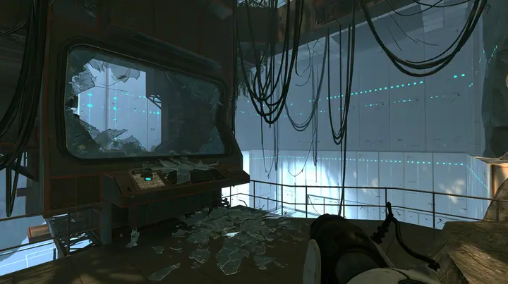 Portal 2 (2011) Source engine screenshot, Valve, a dark observation booth of the test facility high above a white test chamber, its big window smashed outward, glass shards across the console and the floor, the…