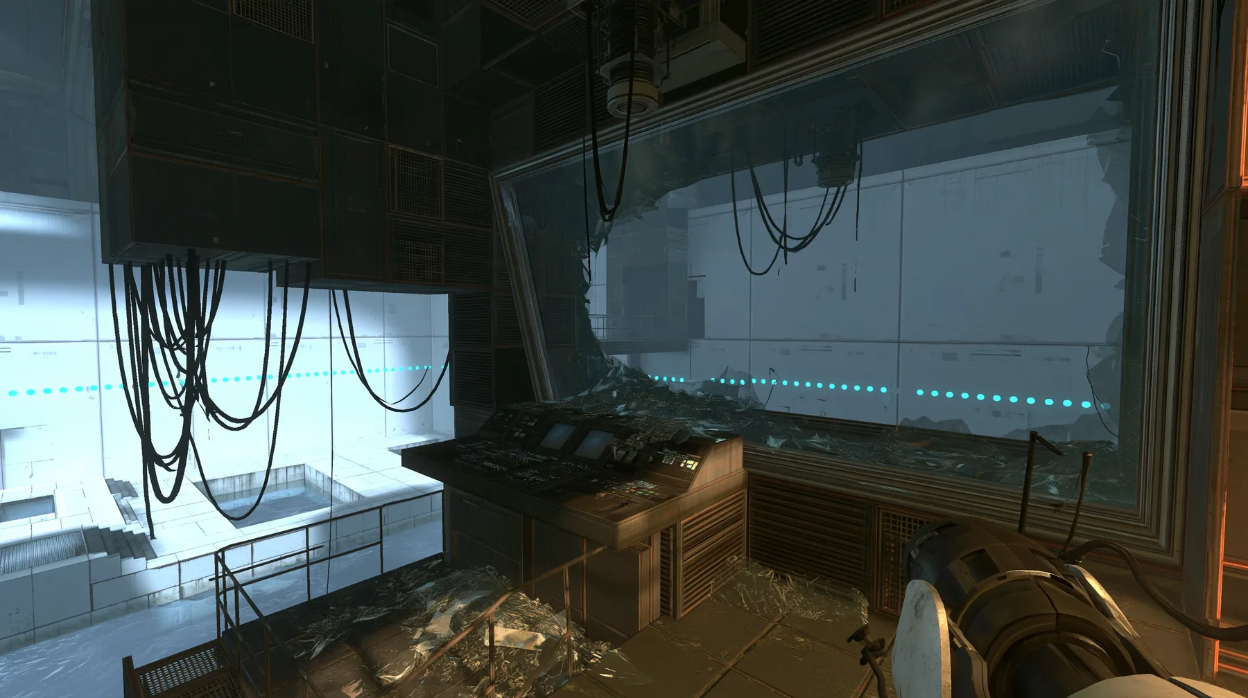 Portal 2 (2011) Source engine screenshot, Valve, a dark observation booth of the test facility high above a white test chamber, its big window smashed outward, glass shards across the console and the floor, the…