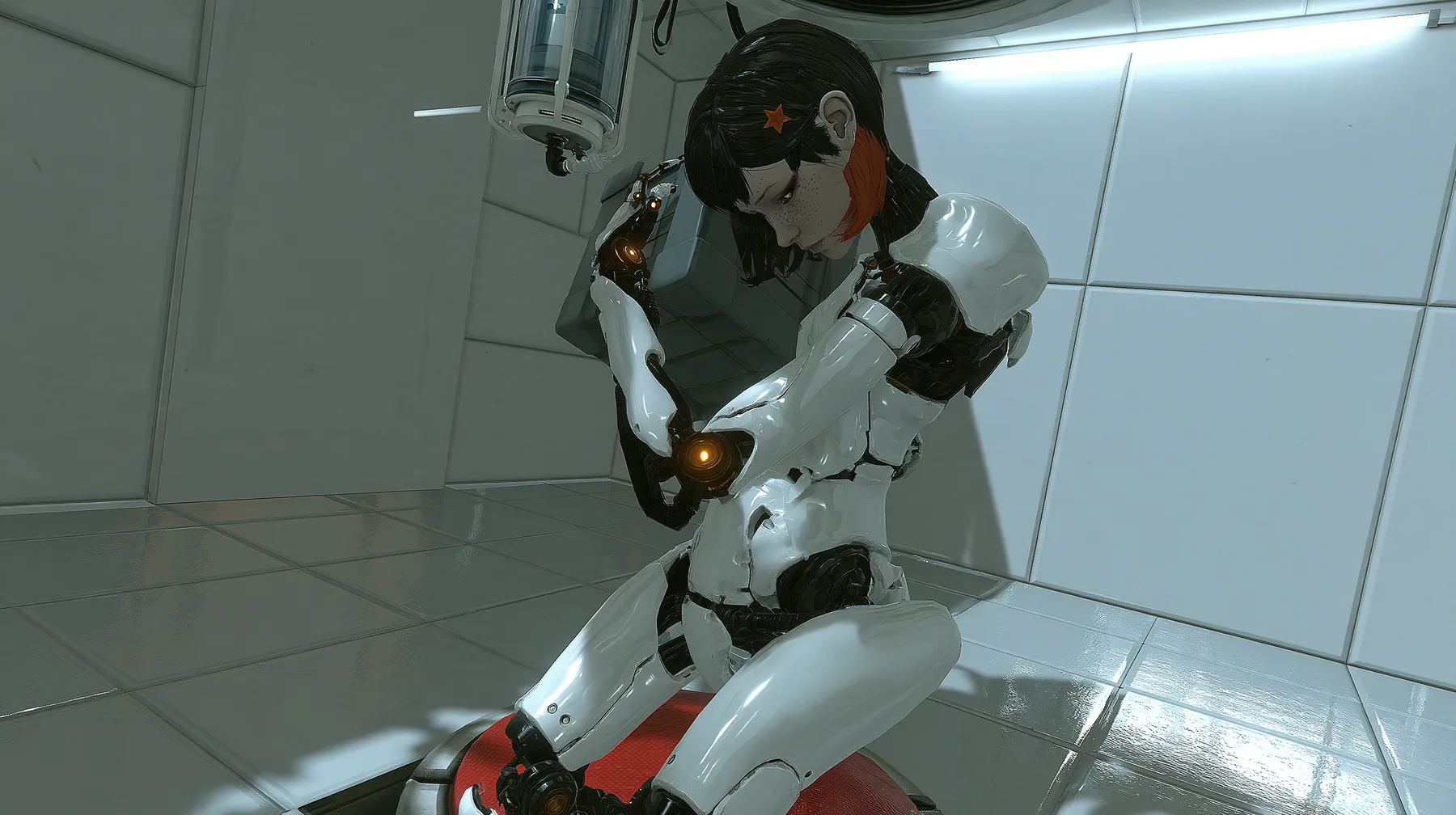 high crane angle looking down into a clean white test chamber: a slender porcelain humanoid android of glossy white plating with black joints and amber joint lights holds a grey storage cube at chest height above a…
