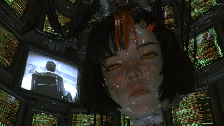 Medium close cinematic film still at a low angle: a giant porcelain android head with black blunt bob, clay-orange streak and small orange star clip hangs from black cables amid dozens of CRT monitors crowded with…