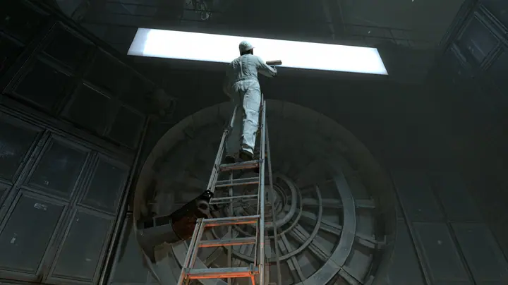 Low-angle cinematic film still: a technician in white overalls and cap, seen from behind on a tall aluminium ladder, rolls white paint across a long backlit sign above a massive round vault door in a dark panelled…