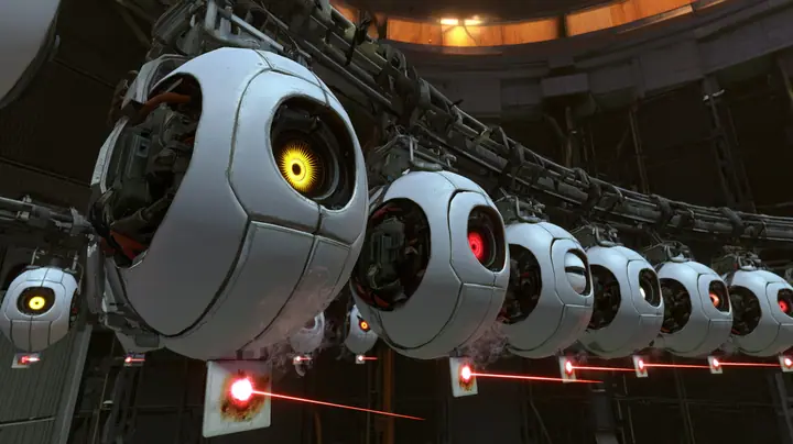 Close cinematic film still: a row of hanging white personality cores on a curved rail, the nearest yellow optic wide open and glowing, the next red optic half lidded and sulking, each core with a small tag below…