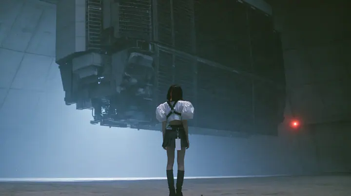 a colossal mechanical split-flap departures board hanging in a dark concrete hall, all flaps blank black, a young woman with a glossy black blunt bob with heavy bangs and one clay-orange streak, a white cropped…