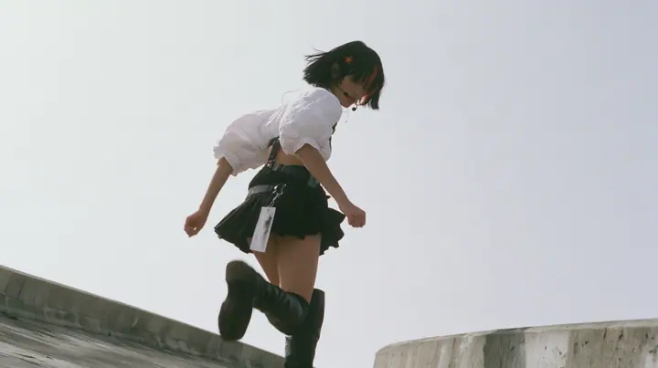 an elevated concrete freeway ramp that ends abruptly in the air against a pure white overexposed sky, a young Caucasian American woman with pale skin and light freckles, a glossy black blunt jaw-length bob with heavy…