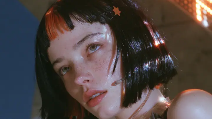 close-up from a low angle of a young Caucasian American woman with pale skin and light freckles, a glossy black blunt jaw-length bob with heavy bangs and one clay-orange streak through the bangs, a small flat…