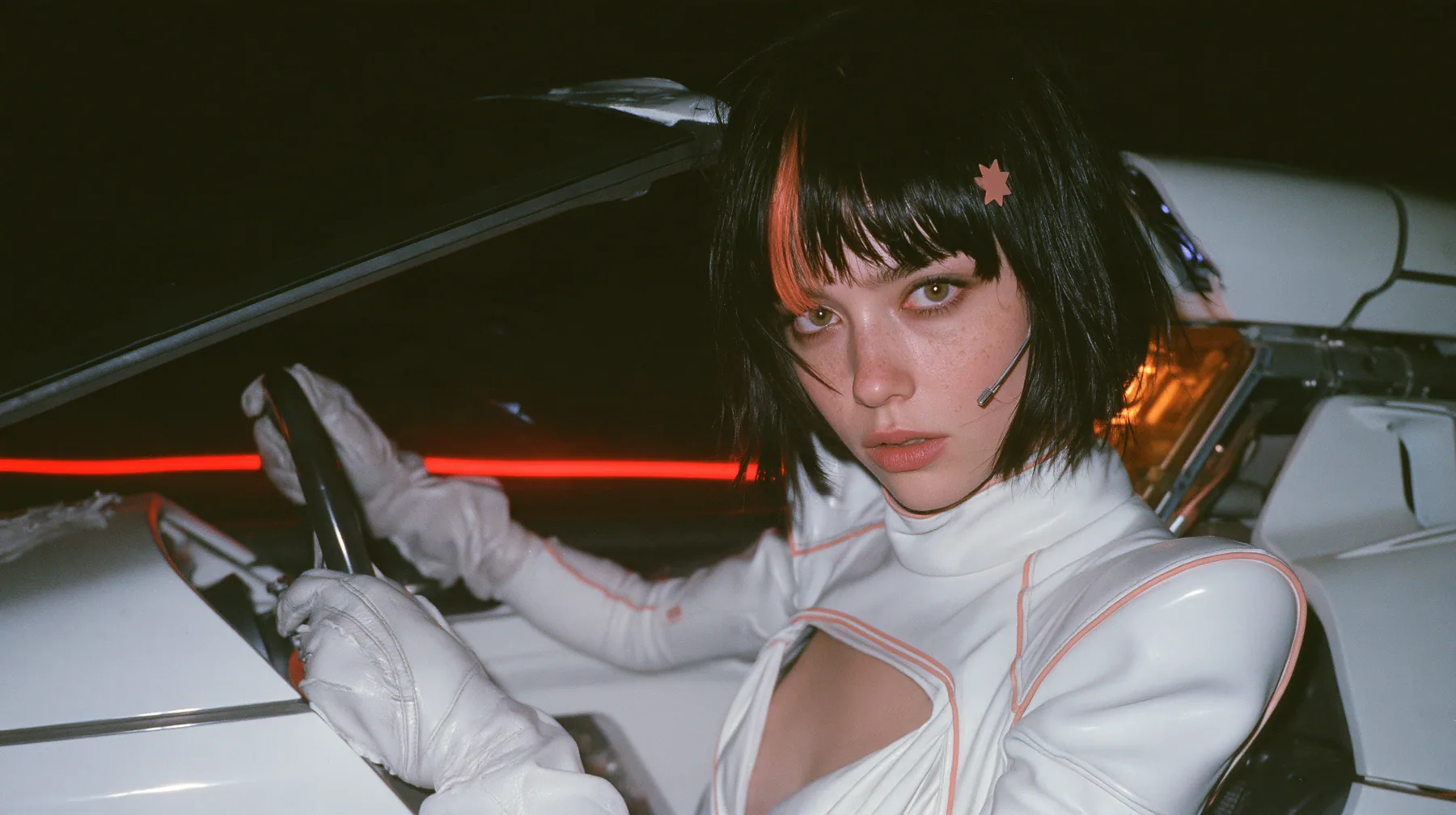 medium close-up, a 28-year-old Caucasian American woman with a grown-up angular face, defined cheekbones and a strong jawline, pale skin and light freckles, a glossy black blunt jaw-length bob with heavy straight…