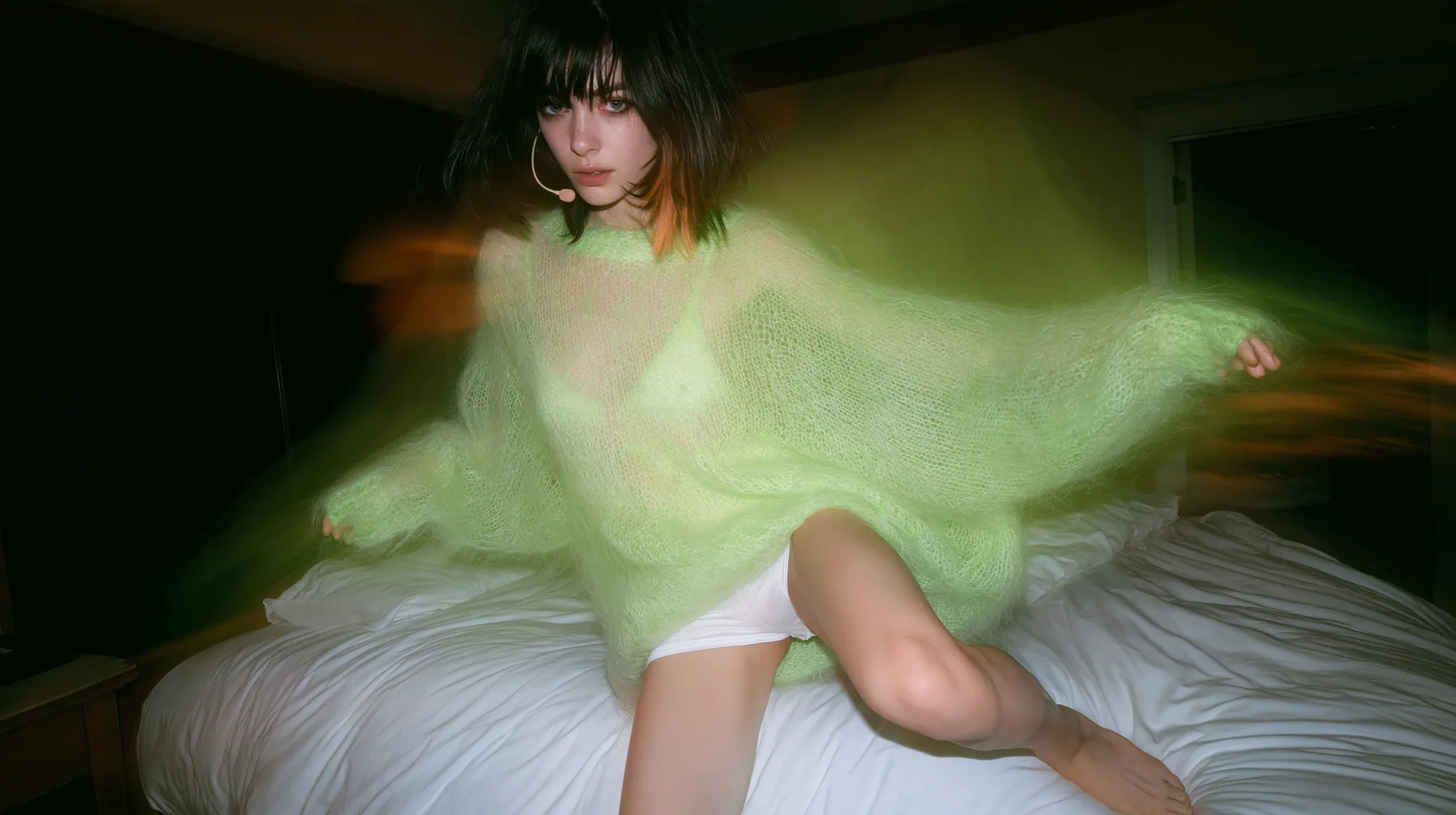 full-length fashion photograph, a Caucasian American woman in her late twenties with pale skin and a glossy black blunt bob with heavy straight bangs and one clay-orange streak, a thin headset microphone, in an…