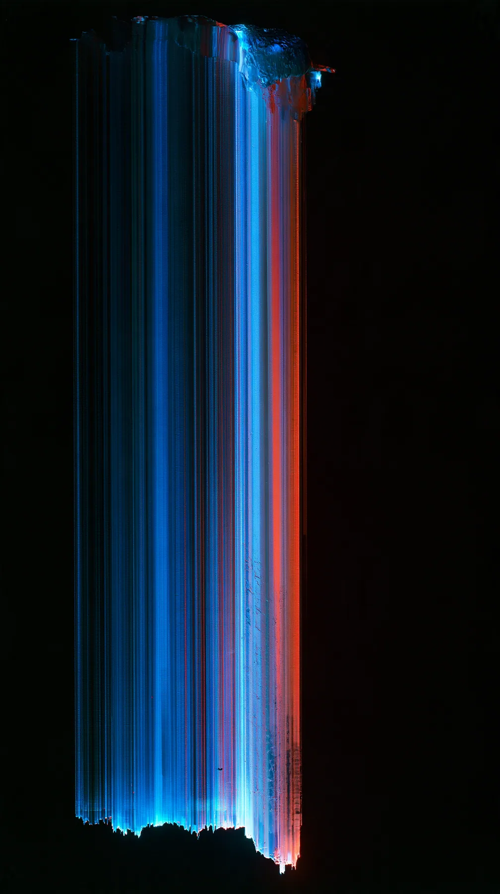 a photograph smeared vertically into long streaks of colour like dragged pixels, deep blues and reds on black, no text, no letters, no logos