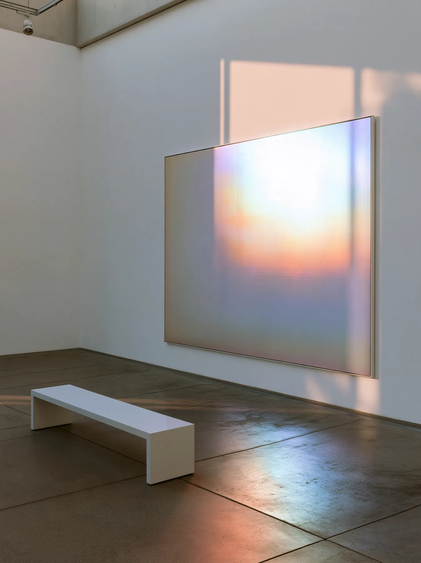 an abstract gradient painting in a white gallery, one bench, soft light, no text, no letters, no logos