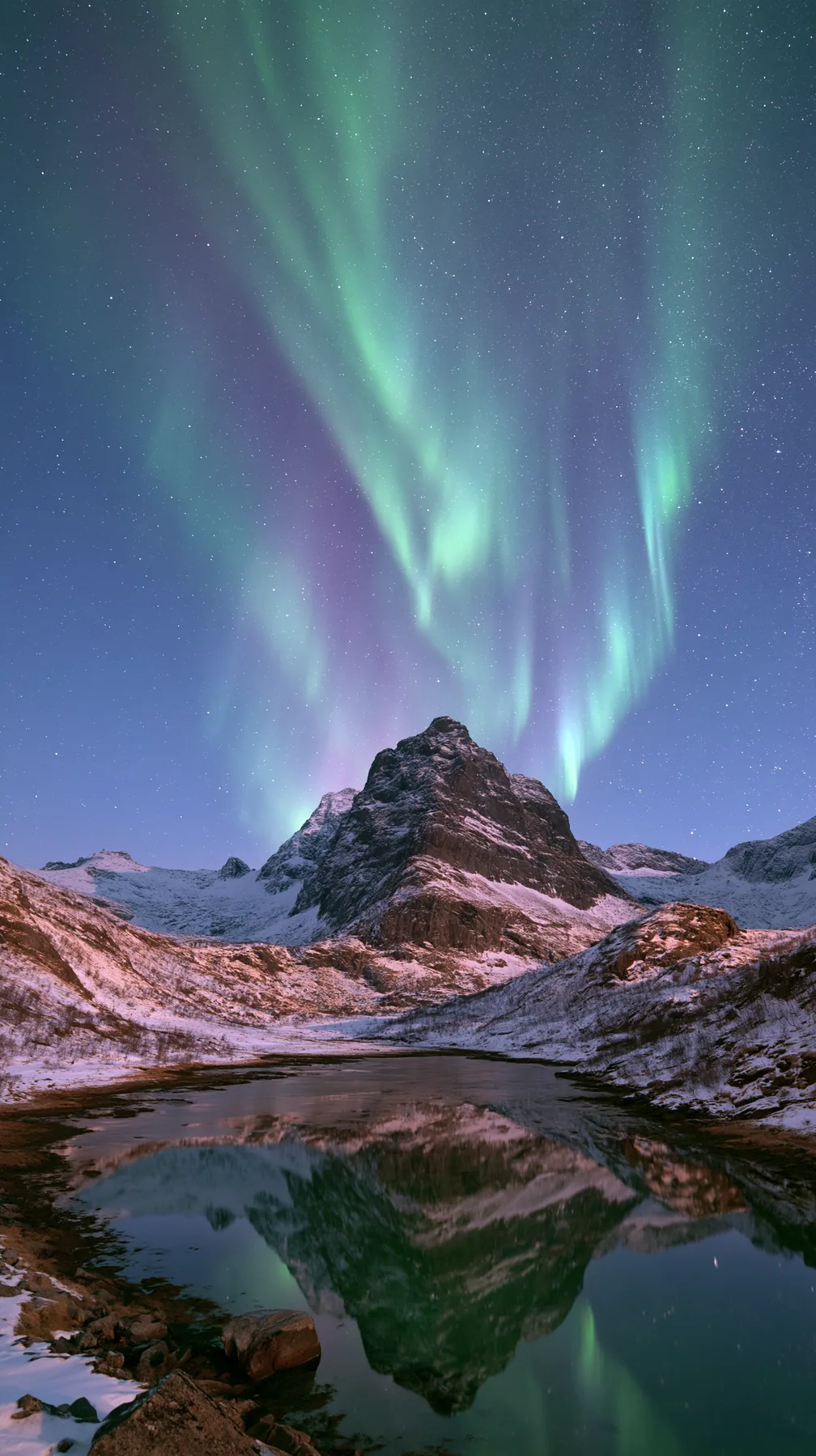 the northern lights rippling green and violet over a snowy mountain lake, no text, no letters, no logos