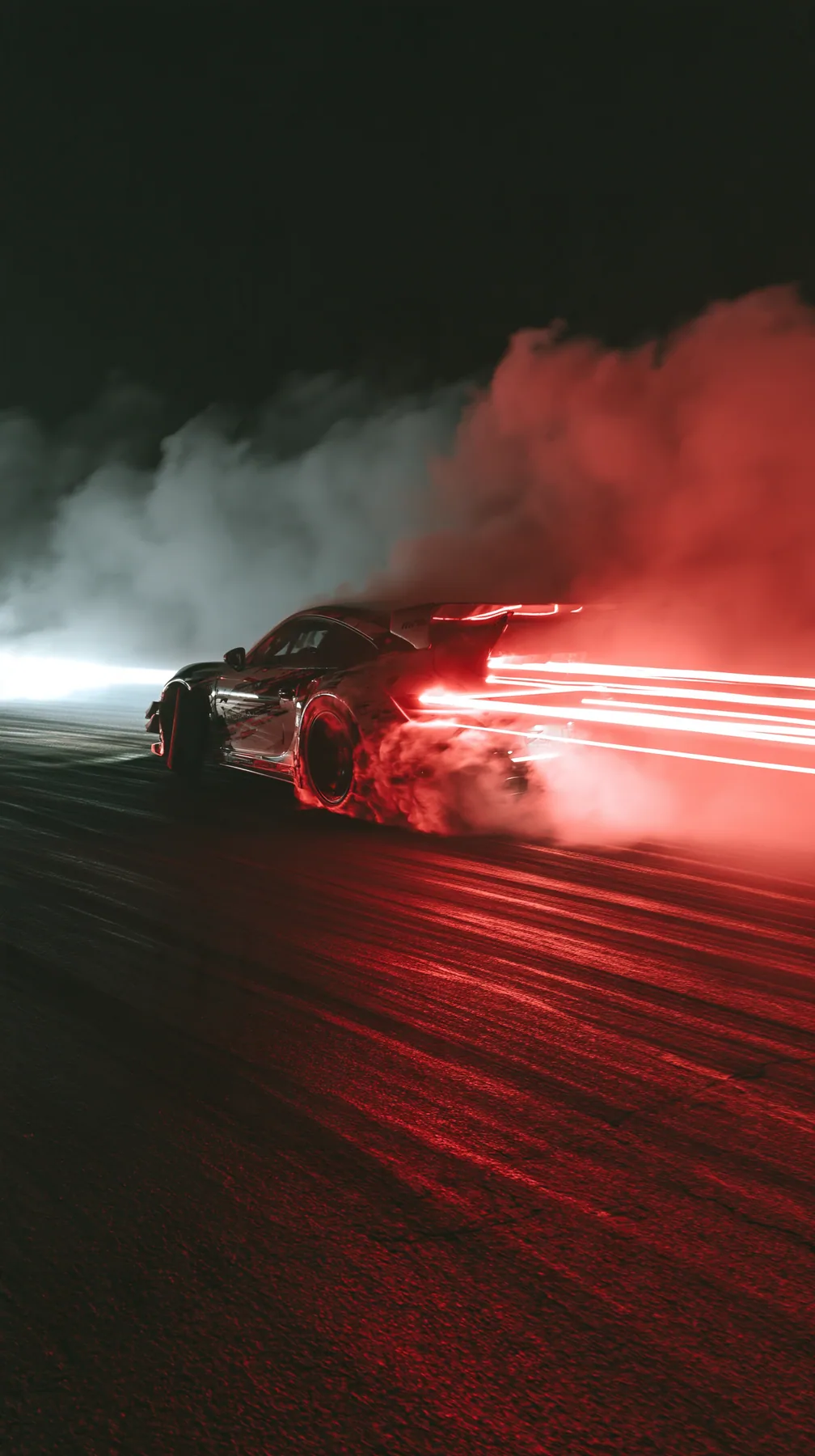 a sports car drifting on a wet track at night, tyre smoke lit red, light trails, no text, no letters, no logos