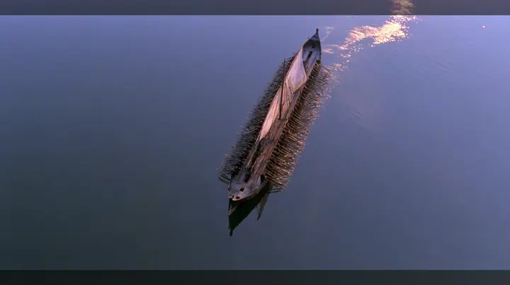 straight-down aerial of a long black ancient Greek galley with a single mast, a square sail and two banks of oars at dusk on a glassy violet sea, the two rows of oars in perfect order like lines on a page, dusk, low…