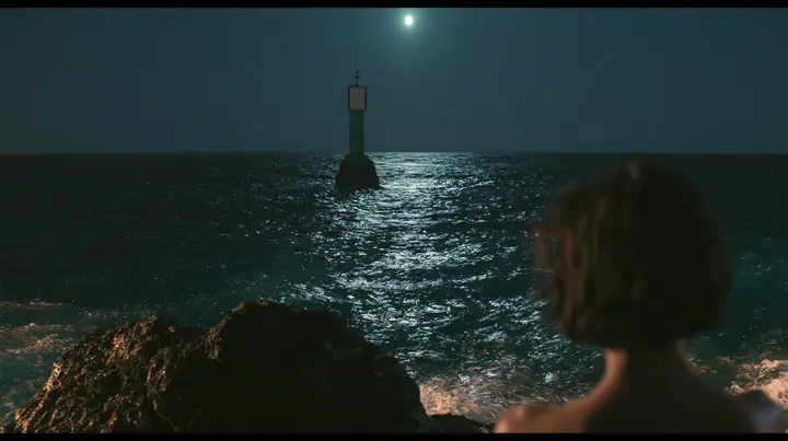 wide shot from beside a woman's bare shoulder on a black sea rock looking out over a dark sea, a navigation buoy bobbing in the middle distance with a blank yellow enamel sign, night, moonlight on a black-teal sea,…