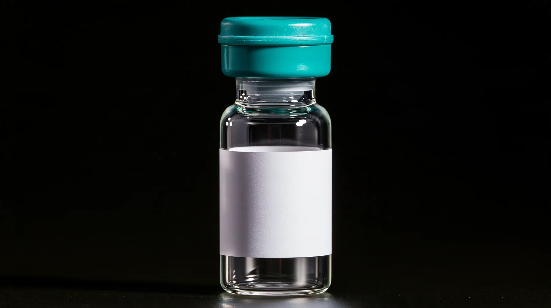 macro product photograph of one small glass peptide vial with a teal flip cap and a blank white label on black, a white strobe glint, macro product photograph, hard rim light, razor-thin focus, no text, no letters,…