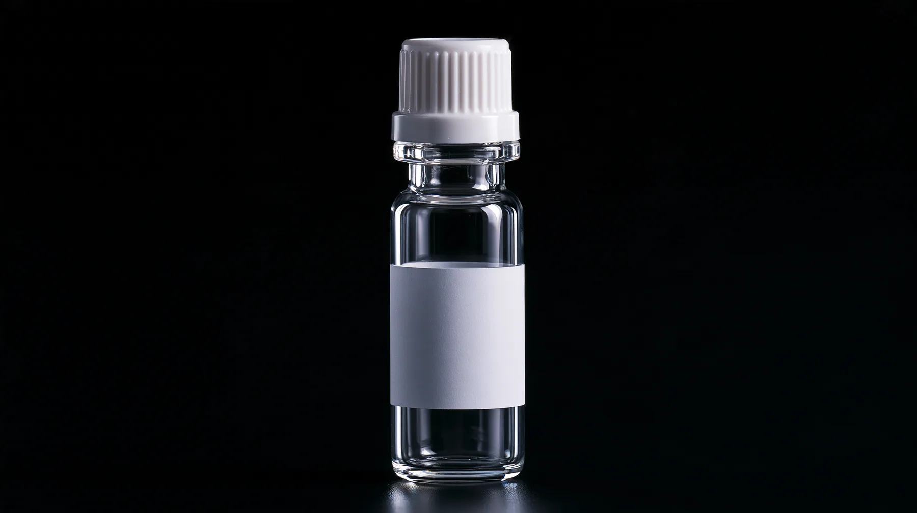 macro product photograph of one small glass peptide vial with a white flip cap and a blank white label on black, a white strobe glint, macro product photograph, hard rim light, razor-thin focus, no text, no letters,…