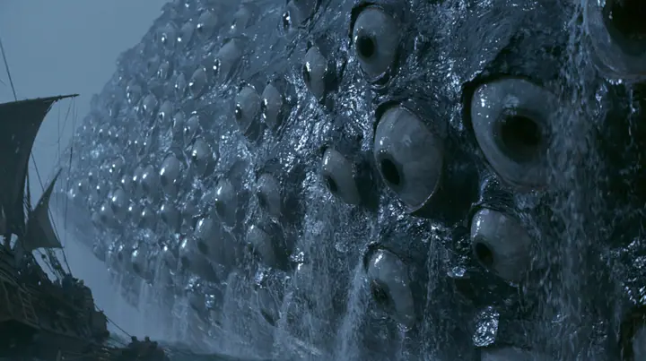close shot along the flank of a gigantic sea creature breaching beside a wooden galley, its glistening dark skin covered in rows of enormous wet eyes with pale irises, the eyes opening one after another, water…