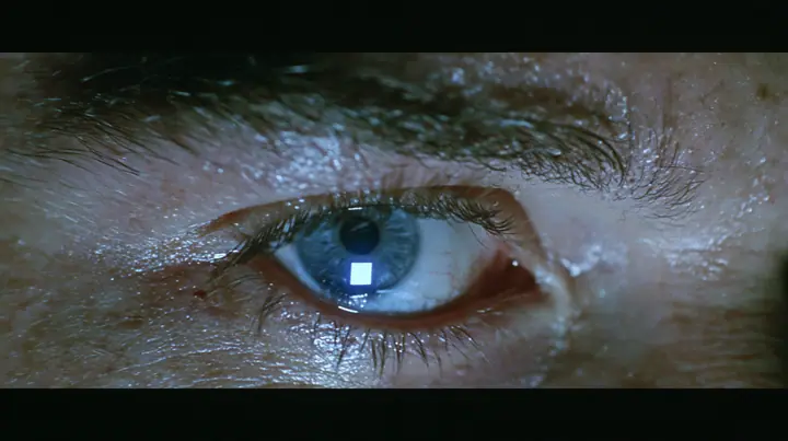 extreme close-up of a man's wide-open pale blue eye at 3am, bloodshot, heavy brow, the glowing rectangle of a phone screen reflected in the eye, a dark bedroom at 3am lit only by a phone screen, blue-white glow on…
