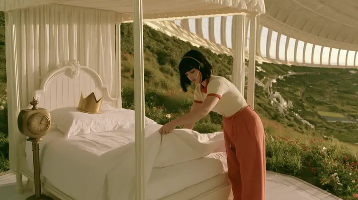 Make this a 35 mm photograph of a white garden pavilion inside a space colony: a royal four-poster bed made up in fine white linen, a gold paper crown on the pillow; beside it a brass punch clock on a post; keep this…