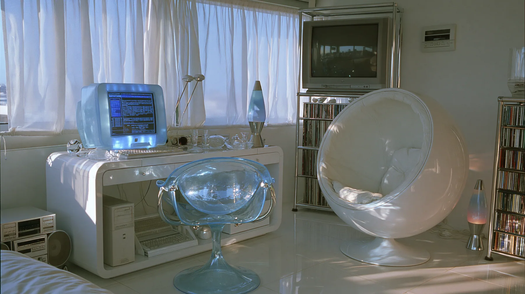 Y2K high fashion editorial photograph, 2001: an interior photograph of a 2001 high-fashion minimalist white loft apartment with molded white plastic furniture, a white lacquer desk, chrome and translucent ice-blue…