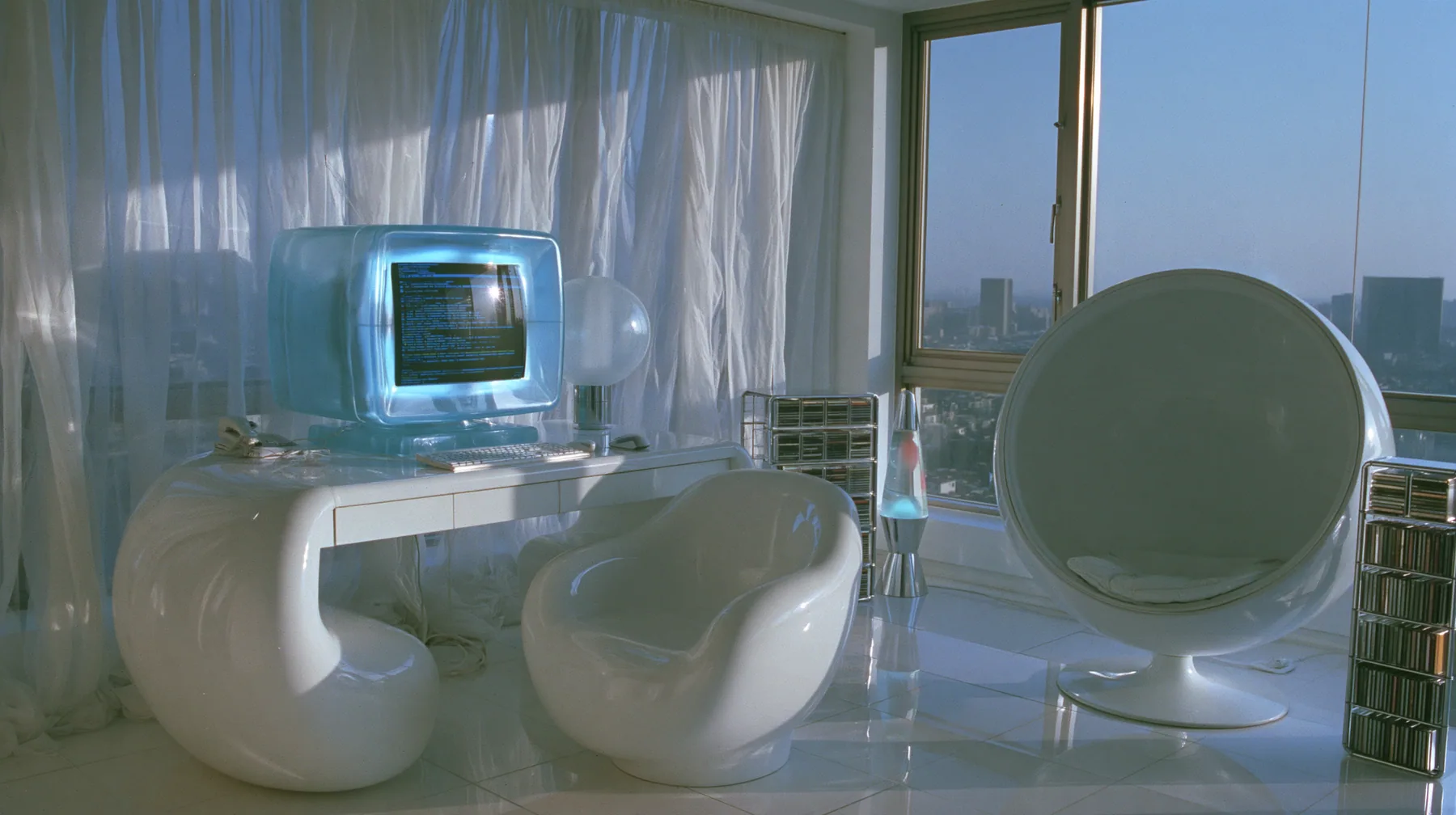 Y2K high fashion editorial photograph, 2001: an interior photograph of a 2001 high-fashion minimalist white loft apartment with molded white plastic furniture, a white lacquer desk, chrome and translucent ice-blue…